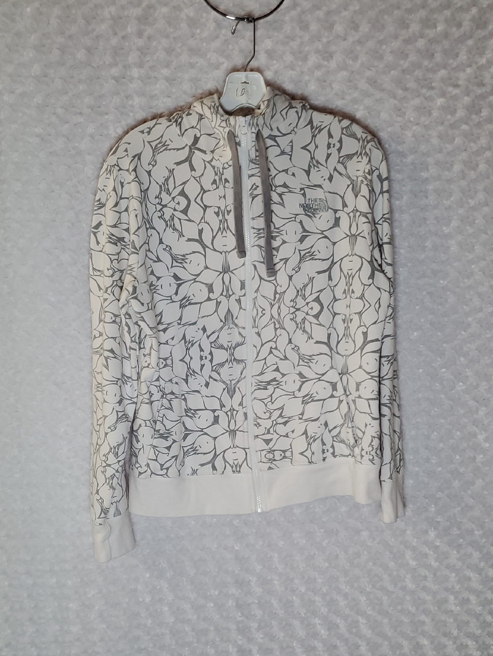 The North Face White Jacket with Gray Floral Pattern